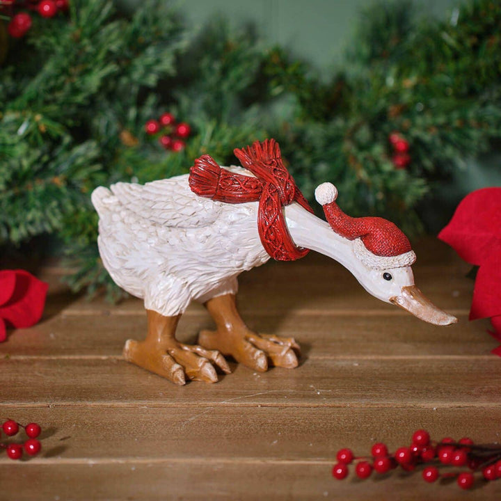 Weihnachtsente  mit rotem Schal und Nikolausmütze