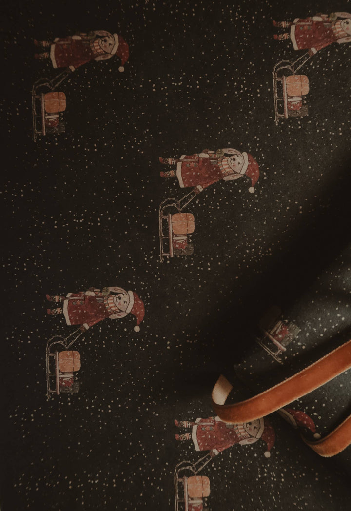 Kraft-Geschenkpapier „Hase mit Schlitten“